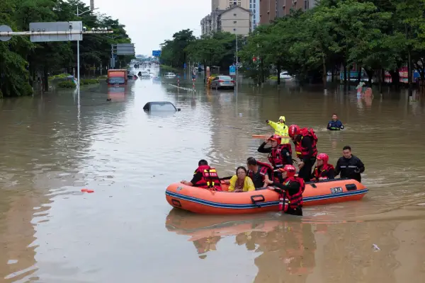 A drone view shows rescue workers evacuating flood-affected residents by boat after heavy rainfall from Typhoon Saudel, in Putian, Fujian province, China September 4, 2026.